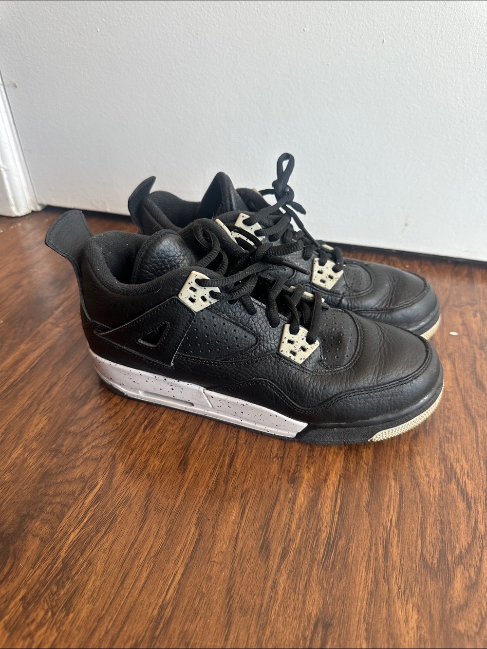 Jordan Women's Black Sneakers with White Speckled Midsole